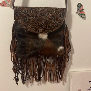 Brand new: W &G purse. Original cowhide.